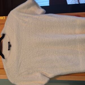 Fuzzy, short sleeve sweater.